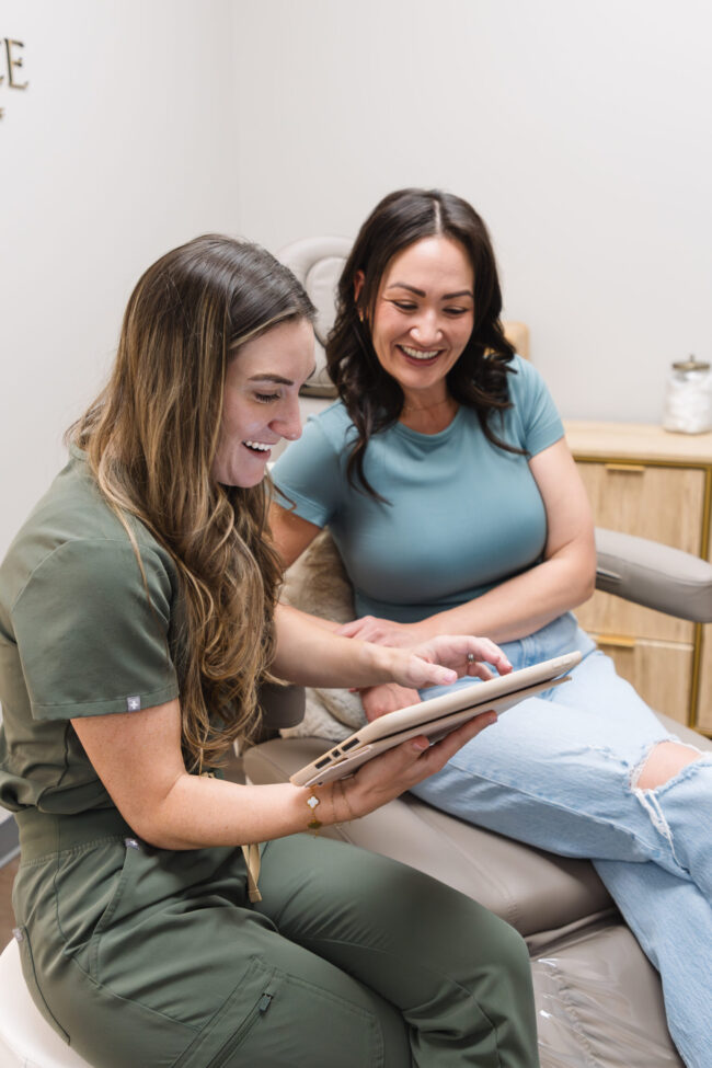 Laser skin treatment consultation at Bare Radiance, showing customized settings for different skin types using advanced laser technology