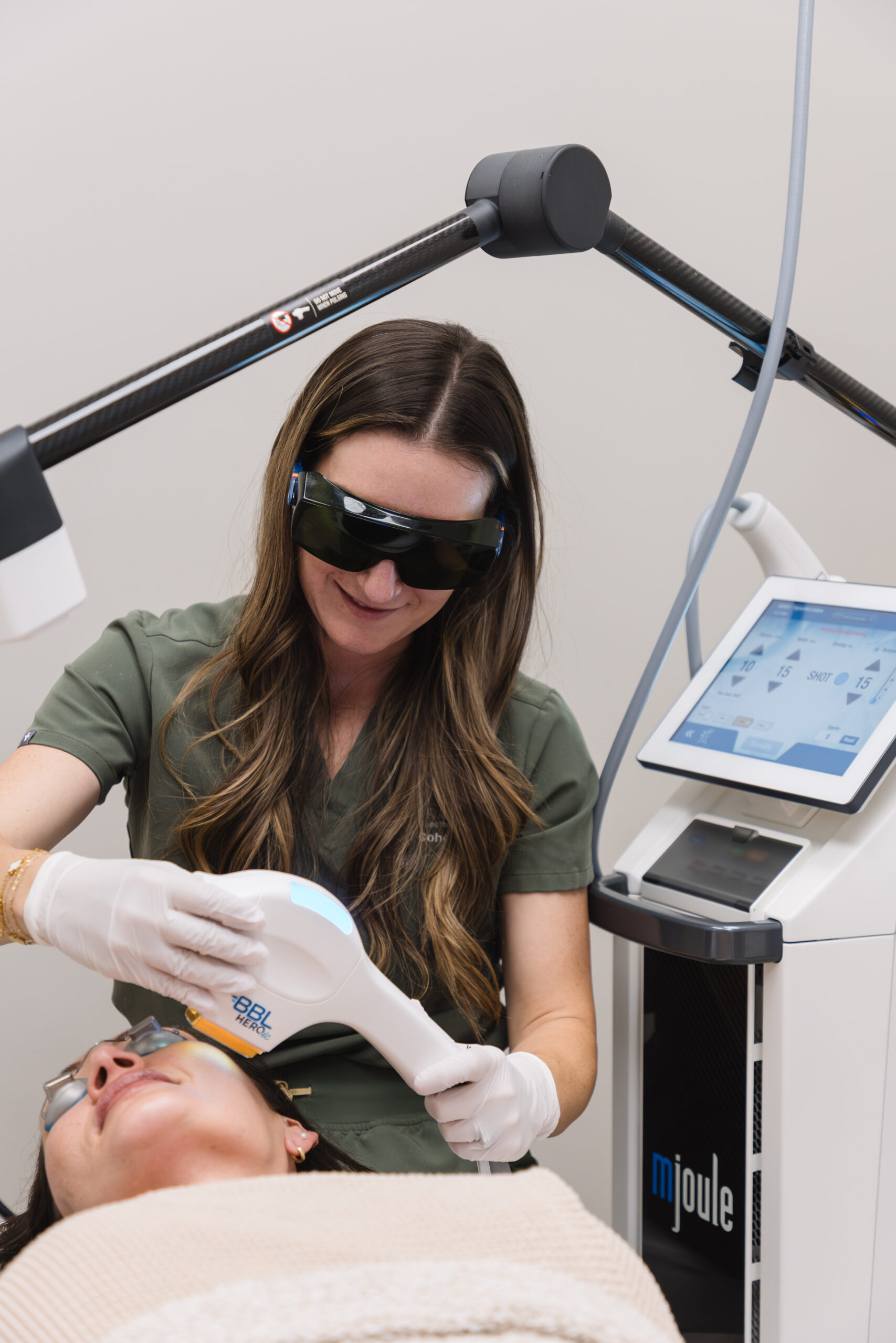 Bare Radiance provider performing a BBL HEROic treatment in Westminster, CO